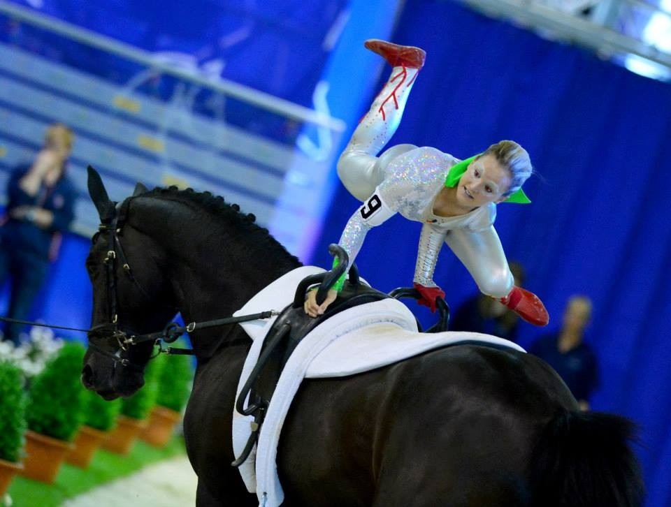 Joanne Eccles winning gold in 2013 vautling to ‘War of the Worlds’ on W.H. Bentley, lunged by John Eccles.
